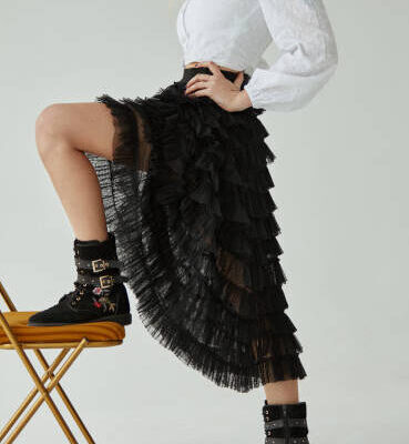 Fashion photo of female blonde model wear black long dress