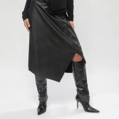 Serie of studio photos of female model in all black look
